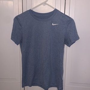 Blue Nike short sleeve shirt.